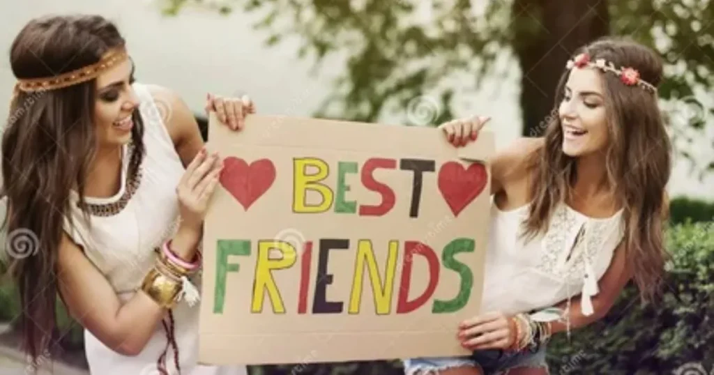 দুই সেরা বন্ধু একসঙ্গে Best Friends লেখা একটি পোস্টার ধরে হাসছে